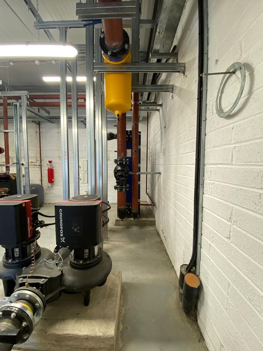 Twin heating pumps and distribution pipework under maintenance