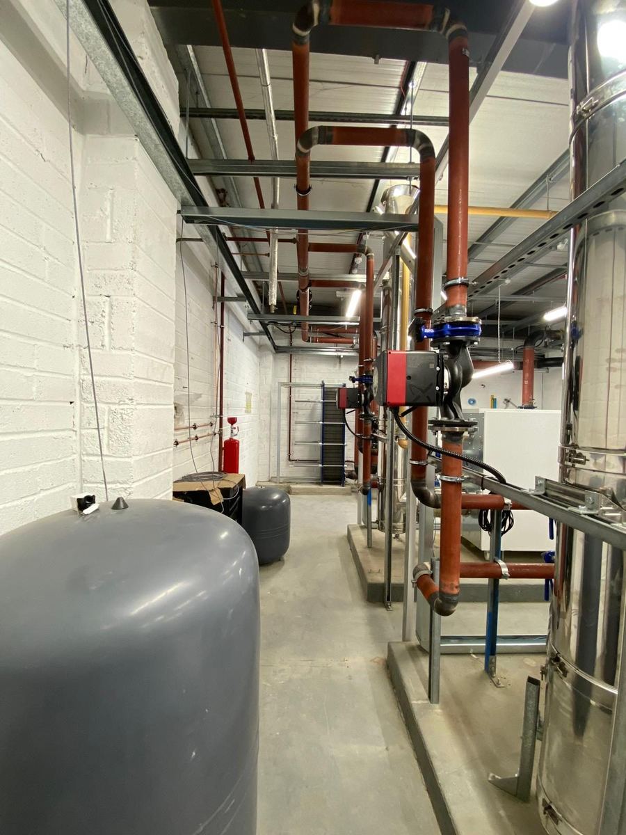 Distribution pipework and expansion vessel in a service corridor, Delta Flow Mechanical project near Maynooth University, Maynooth W23