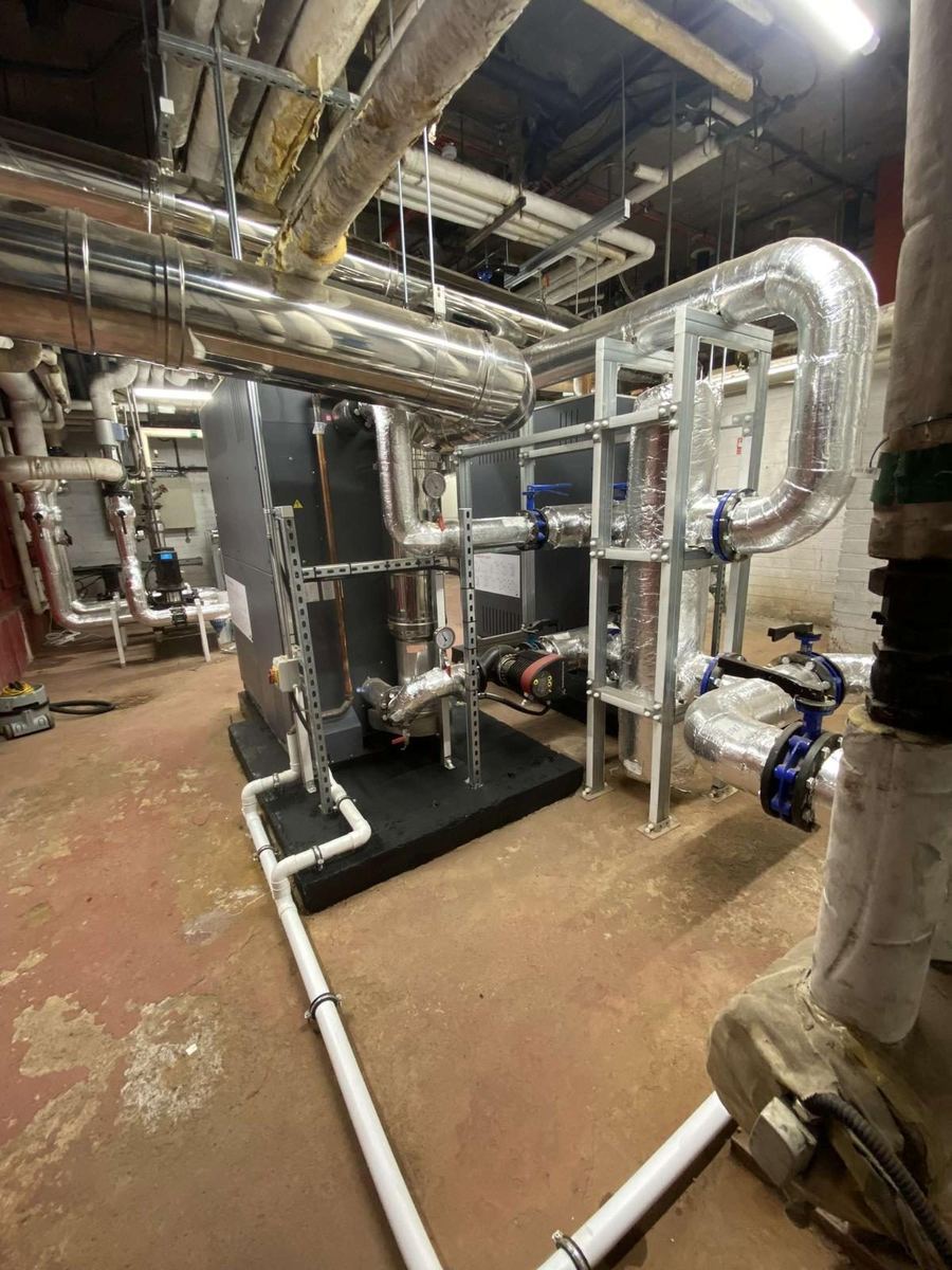 Stainless and insulated pipework with twin pumps on an inertia base