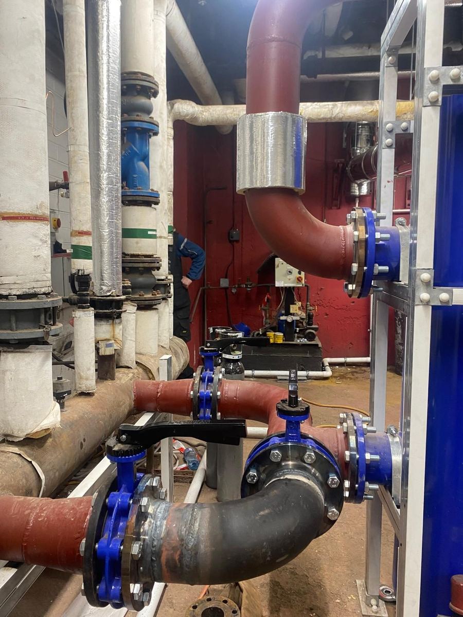 Large bore pipework with butterfly valves and a strainer
